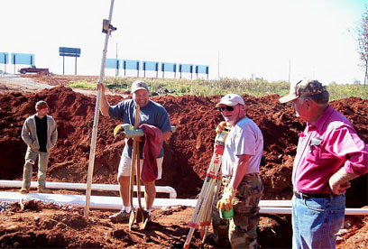 GSI crew celebrating completion and approval of job GSI provides full service septic tank repair and septic system maintenance