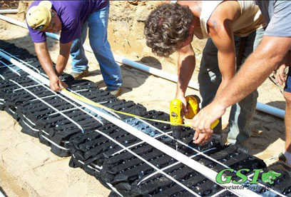 Northeast Georgia septic system repair - contact Gravelator Systems, Inc. preparation of low pressure distribution pipe